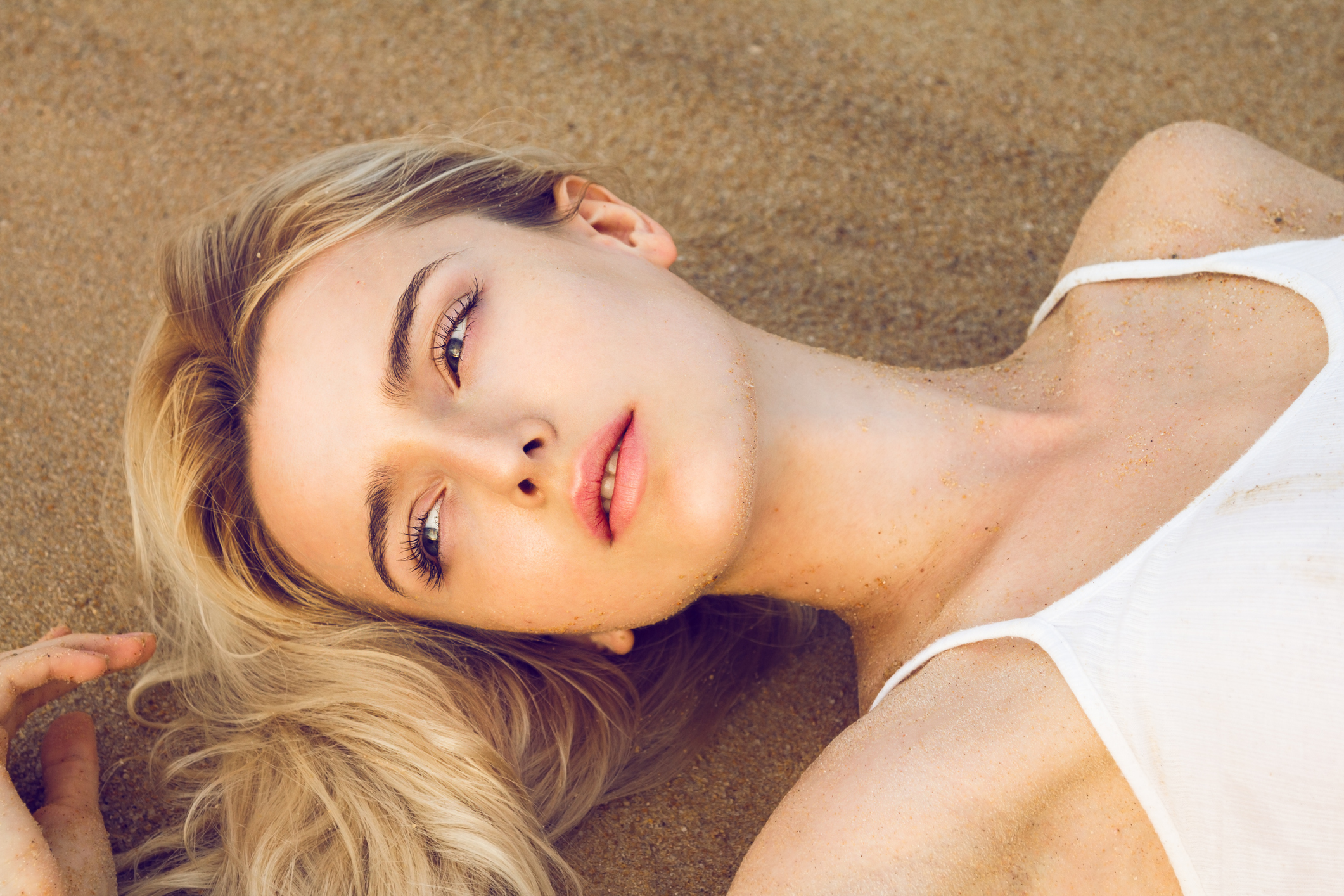 Sexy woman on the beach Body Contouring in Savannah, GA